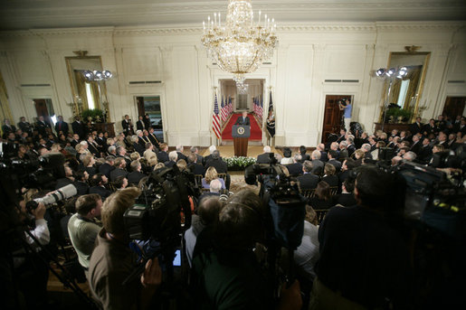 President George W. Bush addresses invited guests, members of the media and White House staff Wednesday. Sept. 6, 2006 in the East Room of the White House, as he discusses the administration's draft legislation to create a strong and effective military commission to try suspected terrorists. The bill being sent to Congress said President Bush, "reflects the reality that we are a nation at war, and that it is essential for us to use all reliable evidence to bring these people to justice." White House photo by Kimberlee Hewitt