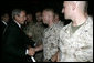 President George W. Bush shakes hands with U.S. Marine reservists from the 4th Civil Affairs Group based in Anacostia, Washington, who are deploying to the Al Anbar Province in Iraq, at Andrews Air Force Base, Friday, September 8, 2006. White House photo by Kimberlee Hewitt