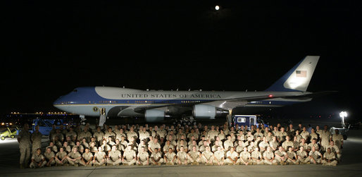 In front of Air Force One at Andrews Air Force Base, President George W. Bush greets U.S. Marine reservists from the 4th Civil Affairs Group based in Anacostia, Washington, who are deploying to the Al Anbar Province in Iraq, Friday, September 8, 2006. White House photo by Kimberlee Hewitt