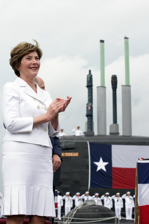 Mrs. Laura Bush, ship sponsor of the USS Texas, applauds at the conclusion of the Commissioning Ceremony Saturday, September 9, 2006, in Galveston, Texas. White House photo by Shealah Craighead
