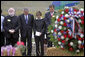 President George W. Bush and Laura Bush stand in silence after placing a wreath to commemorate the fifth anniversary of the September 11th attacks Monday, Sept. 11, 2006, in Shanksvillle, Pa., where United flight 93 crashed after the passengers fought against the terrorist hijackers. White House photo by Eric Draper