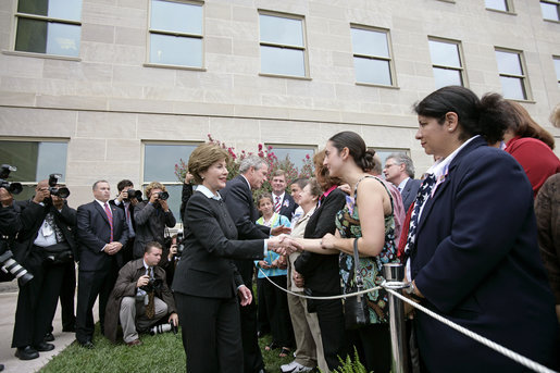 After placing a memorial wreath at the Pentagon, the President and Laura Bush greet audience members Monday, Sept. 11, 2006, during ceremonies marking the fifth anniversary of the September 11th attacks. White House photo by Eric Draper