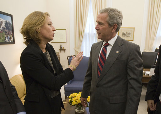 President George W. Bush drops by a meeting between National Security Advisor Stephen Hadley and Minister of Foreign Affairs Tzipi Livni of Israel at the White House Wednesday, Sept. 13, 2006. White House photo by Eric Draper