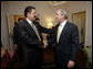 President George W. Bush and President Manuel Zelaya of Honduras greet each other before meeting, Monday, Sept. 18, 2006, at the Waldorf-Astoria Hotel in New York. White House photo by Eric Draper