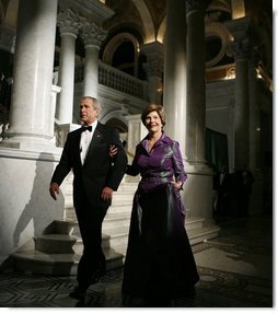 President George W. Bush and Laura Bush walk to the Great Hall of the Library of Congress in Washington, D.C., attending the 2006 National Book Festival Gala, an annual event of books and literature, Friday evening, Sept. 29, 2006.  White House photo by Paul Morse