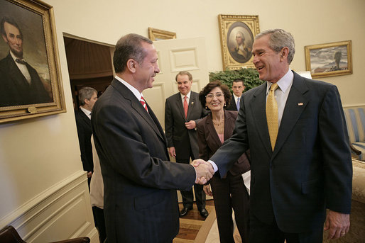 President George W. Bush welcomes Prime Minister Recep Tayyip Erdogan of Turkey to the Oval Office Monday, October 2, 2006. White House photo by Eric Draper