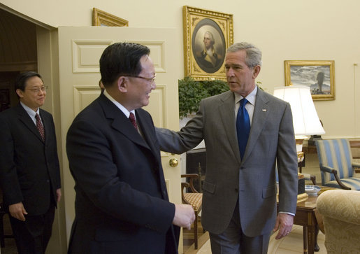 President George W. Bush meets with The State Councilor of China, Tang Jiaxuan, in the Oval Office Thursday, Oct. 12, 2006. White House photo by Kimberlee Hewitt