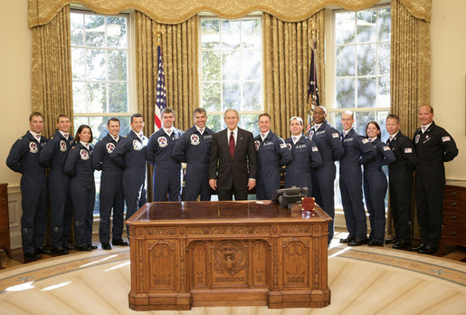 President George W. Bush welcomes members of the U.S. Air Force Thunderbirds to the Oval Office, Friday, Oct. 13, 2006. The Thunderbirds are scheduled to perform a fly over for the opening of the Air Force Memorial in Arlington, Va., Saturday, Oct. 14, 2006. White House photo by Eric Draper