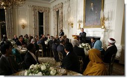 President George W. Bush addresses the Iftaar Dinner with Ambassadors and Muslim leaders in the State Dining Room of the White House, Monday, Oct. 16, 2006.  White House photo by Paul Morse