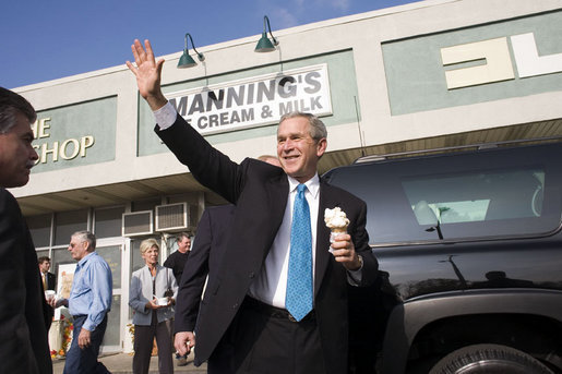 With ice cream in hand, President George W. Bush departs Manning's Ice Cream and Milk in Clarks Summit, Pa., Thursday, Oct. 19, 2006. White House photo by Paul Morse