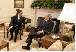 President George W. Bush meets with President Leonel Fernandez of the Dominican Republic in the Oval Office Wednesday, Oct. 25, 2006. White House photo by Eric Draper