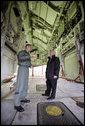 Vice President Dick Cheney stands in the bomb bay of a B-2 Stealth bomber with Lt. Col. Bill Eldridge, left, during a tour at Whiteman Air Force Base, Missouri, Friday, October 27, 2006. White House photo by David Bohrer