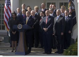 President George W. Bush stands with his Cabinet during a Rose Garden address to the media. "As the new members of Congress and their leaders return to Washington, I've instructed my Cabinet to provide whatever briefings and information they need to be able to do their jobs," said the President. "The American people expect us to rise above partisan differences, and my administration will do its part."  White House photo by David Bohrer