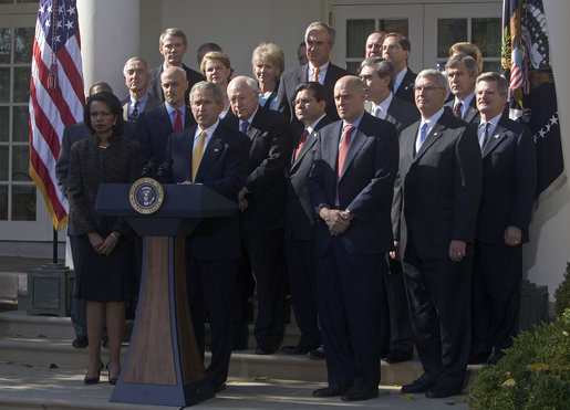 President George W. Bush stands with his Cabinet during a Rose Garden address to the media. "As the new members of Congress and their leaders return to Washington, I've instructed my Cabinet to provide whatever briefings and information they need to be able to do their jobs," said the President. "The American people expect us to rise above partisan differences, and my administration will do its part." White House photo by David Bohrer