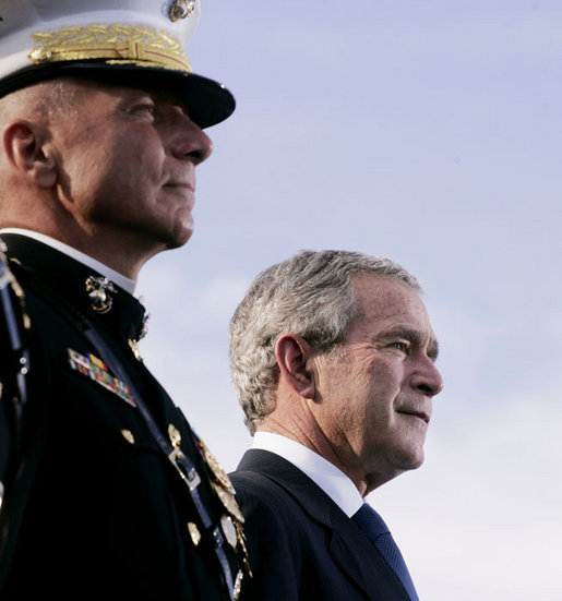 President George W. Bush stands with Commandant of the Marine Corps, General Michael Hagee, at the dedication ceremony of the National Museum of the Marine Corps Friday, Nov. 10, 2006, in Quantico, Va. White House photo by Paul Morse