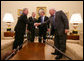 President George W. Bush and Vice President Dick Cheney thank Senate Democratic leaders Sen. Richard Durbin and Sen. Harry Reid for coming to the White House for a post-election meeting Friday, Nov. 10, 2006. President Bush said, "There is a great opportunity for us to show the country that Republicans and Democrats are equally as patriotic and equally concerned about the future, and that we can work together." White House photo by David Bohrer