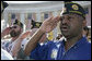 Veterans from the American Legion Post Thurmont, Md., salute during Veteran’s Day ceremonies Saturday, Nov. 11, 2006, at Arlington National Cemetery in Arlington, Va., where President George W. Bush lay a wreath at the Tomb of the Unknowns, and addressed veterans, their family members and guests. White House photo by Kimberlee Hewitt