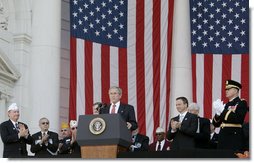 President George W. Bush is applauded as he addresses the Veteran’s Day ceremonies Saturday, Nov. 11, 2006, at Arlington National Cemetery in Arlington, Va.  White House photo by Kimberlee Hewitt