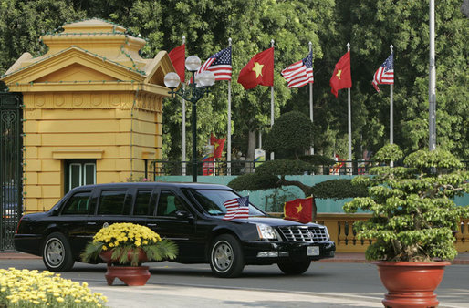 The limousine carrying President George W. Bush and Mrs. Laura Bush arrives at the Presidential Palace in Hanoi Friday, Nov. 17, 2006. The arrival in Vietnam of President Bush marks only the second time a U.S. president has visited the country. White House photo by Paul Morse