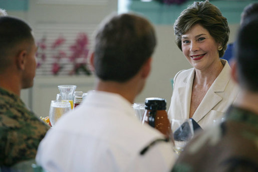 Mrs. Laura Bush visits during breakfast with military personnel Tuesday, Nov. 21, 2006, at the Officers Club at Hickam Air Force Base in Honolulu, Hawaii. White House photo by Shealah Craighead