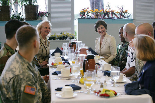 Mrs. Laura Bush is joined by Mary Fallon, left, wife of Navy Admiral William J. Fallon the Commander of the U.S. Pacific Command, during breakfast with military personnel Tuesday, Nov. 21, 2006, at the Officers Club at Hickam Air Force Base in Honolulu, Hawaii. White House photo by Shealah Craighead