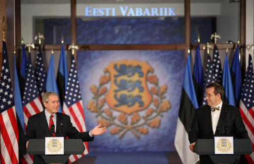 President George W. Bush smiles as he joins President Toomas Hendrik Ilves of Estonia, at the National Bank of Estonia in Tallinn Tuesday, Nov. 28, 2006, for a joint press availability. President Bush told his counterpart, "I'm proud to be the first sitting American President to visit Estonia." White House photo by Paul Morse