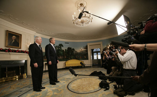President George W. Bush and Robert Gates, the President's nominee for Secretary of Defense, stand before the press Tuesday morning, Dec. 5, 2006, in the Diplomatic Reception Room of the White House. Said the President, "Bob Gates will be a fine Secretary of Defense. I hope for a speedy confirmation so he can get sworn in and get to work." White House photo by Eric Draper