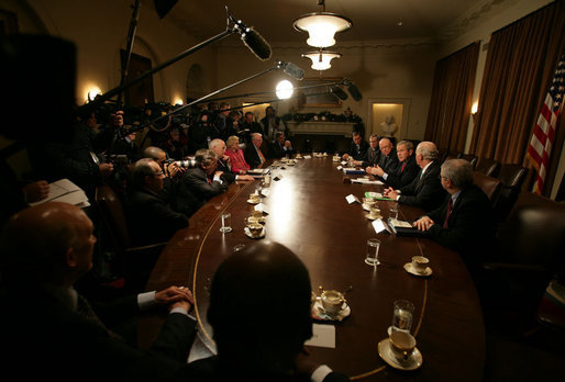 President George W. Bush is joined by members of the Iraq study group Wednesday, Dec. 6, 2006, as he delivers remarks from the Cabinet Room after receiving the group's report. Said the President, "This report gives a very tough assessment of the situation in Iraq. It is a report that brings some really very interesting proposals, and we will take every proposal seriously and we will act in a timely fashion." White House photo by David Bohrer