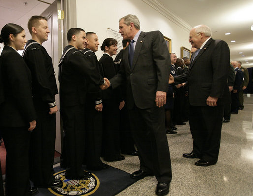President George W. Bush and Vice President Dick Cheney shake hands with military personnel following their meeting with U.S. military leaders at the Pentagon, Wednesday, Dec. 13, 2006. White House photo by Eric Draper