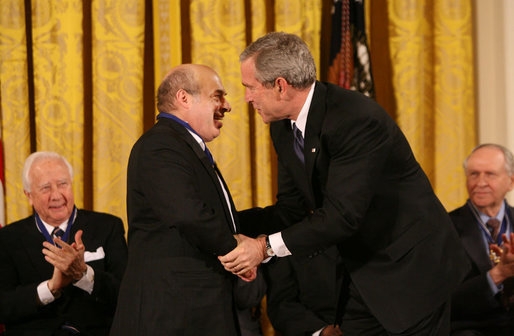 President George W. Bush congratulates Natan Sharansky after honoring him with the 2006 Presidential Medal of Freedom during ceremonies Friday, Dec. 15, 2006, at the White House. Said the President, "Americans first came to know Natan Sharansky as a voice for freedom inside an empire of tyranny. As a free man, he's become a political leader in Israel. He remains, above all, an eloquent champion for liberty and democracy. We honor Natan Sharansky for his life of courage and conviction." White House photo by Eric Draper