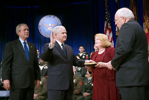 Vice President Dick Cheney swears in Robert Gates as Secretary of Defense at the Pentagon Monday, Dec. 18, 2006. Mr. Gate's wife Becky is pictured holding the Bible during the ceremony. White House photo by Eric Draper