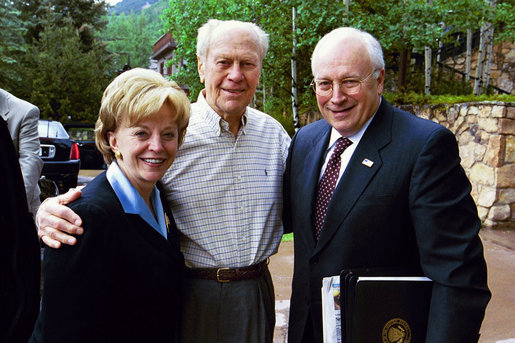 Former President Gerald R. Ford stands with Vice President Dick Cheney and Mrs. Lynne Cheney upon their arrival to Beaver Creek, Colorado for the American Enterprise Institute World Forum, June 20, 2003. President Ford, in partnership with British Prime Minister James Callaghan, French President Valery Giscard D'Estaing, and German Chancellor Helmut Schmidt, created the AEI World Forum to annually gather senior business executives, government officials, and world scholars for dialogue in international finance, trade, national security, social policy, and politics. White House photo by David Bohrer