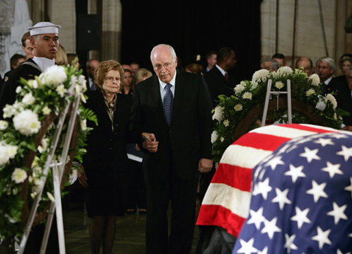 Vice President Dick Cheney holds the hand of former first lady Betty Ford as they stand before the casket of former President Gerald R. Ford during the State Funeral ceremony in the Capitol Rotunda on Capitol Hill, Saturday, December 30, 2006. White House photo by David Bohrer