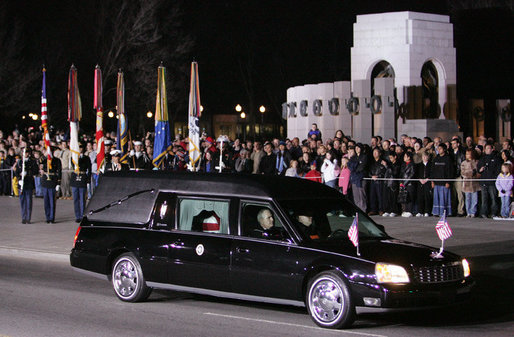 The hearse carrying the casket of former President Gerald R. Ford pauses at the World War II Memorial in Washington, D.C., Saturday evening, Dec. 30, 2006, in tribute to President Ford’s service in the U.S. Navy during World War II, prior to the State Funeral ceremony at the U.S. Capitol. White House photo by Kimberlee Hewitt