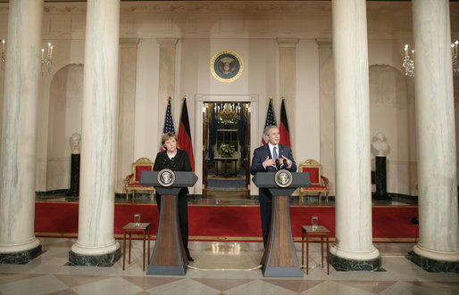 President George W. Bush responds to a reporter’s question during a joint news conference with German Chancellor Angela Merkel at the White House, Thursday, Jan. 4, 2006, answering questions on Iraq, the Middle East and U.S.-European economic issues. White House photo by Paul Morse