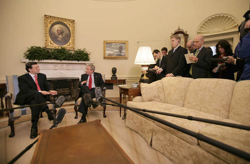 President George W. Bush and European Commission President José Manuel Barroso meet members of the media in the Oval Office, Monday, January 8, 2007. White House photo by Eric Draper