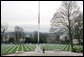 Within site of the Eiffel Tower, an American Flag hangs at half-staff during the official period of mourning for President Gerald R. Ford at the Suresnes American Cemetery near Paris Tuesday, Jan. 16, 2007. Dedicated in 1919 by President Woodrow Wilson, the cemetery was established for American troops who died in World War I. In 1952, a World War II section was added for the remains of 24 unknown soldiers. White House photo by Shealah Craighead