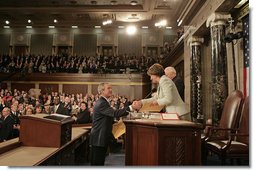 President George W. Bush greets Speaker of the House Nancy Pelosi before delivering his State of the Union Address at the U.S. Capitol Tuesday, Jan. 23, 2007. White House photo by Eric Draper