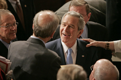 President George W. Bush greets people, shakes hands and signs his autograph after delivering the State of the Union Address in the House Chamber at the U.S. Capitol Tuesday, Jan. 23, 2007. White House photo by Paul Morse
