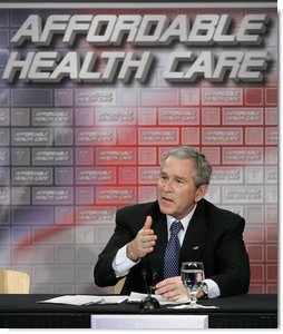 President George W. Bush gestures as he participates in a roundtable discussion on health care initiatives at the Saint Luke’s-Lee’s Summit hospital in Lee’s Summit, Mo., Thursday, Jan 25, 2007. White House photo by Eric Draper