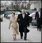 President George W. Bush and Laura Bush walk together as they leave the White House grounds Friday, Jan 26, 2007, to attend the farewell reception at Blair House for White House Counsel Harriet Miers. White House photo by Eric Draper