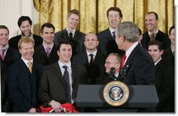 President George W. Bush jokes with members of the Carolina Hurricanes hockey team, winners of the 2006 Stanley Cup, Friday, Feb. 2, 2007 in the East Room at the White House.  White House photo by Paul Morse