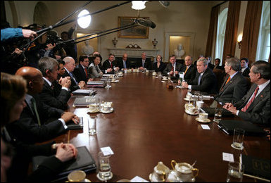 President George W. Bush talks with the media during a Cabinet meeting in the Cabinet Room Monday, Feb. 5, 2007. 'I appreciate my Cabinet joining me today as we discussed our budget,' said the President. 'Today we submit a budget to the United States Congress that shows we can balance the budget in five years without raising taxes.' White House photo by David Bohrer