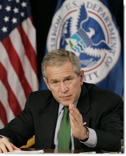 President George W. Bush gestures during a briefing Thursday, Feb. 8, 2007 at the Department of Homeland Security in Washington, D.C., on the status of DHS's priorities, especially those relating to the War on Terror. White House photo by Paul Morse