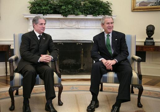 President George W. Bush and Amine Gemayel, former President of Lebanon, talk with reporters in the Oval Office Thursday, Feb. 8, 2007, during Gemayel's visit to the White House. White House photo by Paul Morse