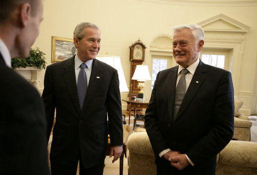 President George W. Bush is introduced to officials accompanying Lithuania's President Valdas Adamkus Monday, Feb. 12, 2007, during the leader's visit to the White House. White House photo by Eric Draper