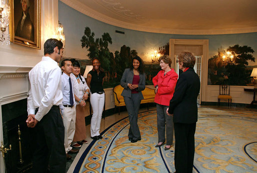 Mrs. Laura Bush talks with recipients of the 2007 Corps Member of the Year Award at the White House on Monday, Feb. 12, 2007. As part of the Helping America's Youth Initiative, The Corp Network engages disadvantaged youth in education, career preparation and life skill development and honors youth who become involved in their communities, overcome adversity, and become role models for America’s young people. White House photo by Shealah Craighead