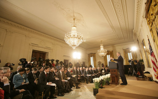 President George W. Bush delivers brief remarks before taking questions from the White House press pool Wednesday, Feb. 14, 2007, during a press conference in the East Room of the White House. White House photo by Eric Draper