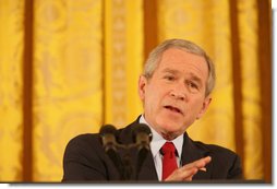President George W. Bush emphasizes a point as he speaks to reporters Wednesday, Feb. 14, 2007, during a press conference in the East Room of the White House. The President spoke on Iraq, Iran and North Korea, as well as bipartisan opportunities, including education, energy, health care and a balanced budget.  White House photo by Shealah Craighead