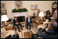 President George W. Bush talks with members of the media during his meeting with Panamas President Martin Torrijos in the Oval Office, Friday, Feb. 16, 2007.  White House photo by Eric Draper